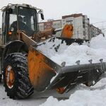 фото Вывоз снега в Купавне самосвалами.